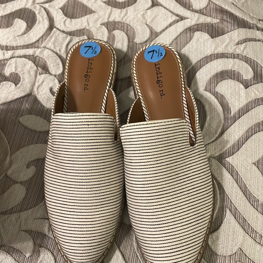 Never worn mules, comes in box